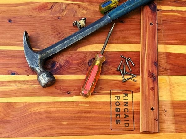 hammer screwdriver screws on cedar stamped kincaid robes