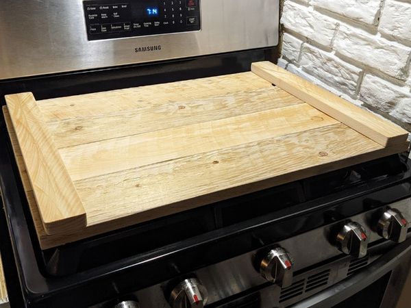 unfinished natural stove cover on stainless gas range